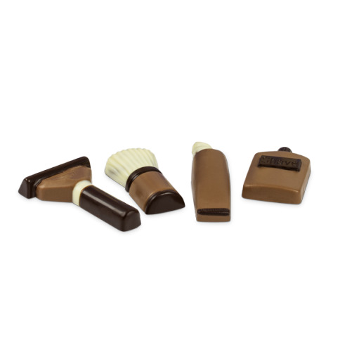 czekoladowe figurkki, czekolada mleczna, czekoladowa maszynka do golenia, czekoladowe kosmetyki dla mężczyzny