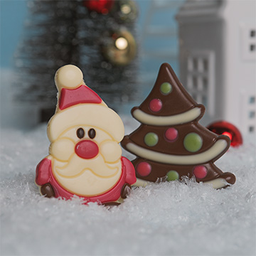 Figurka św Mikołaja z belgijskiej czekolady z czekoladową choinką