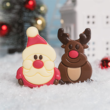 Św, Mikołaj z białej czekolady z reniferem