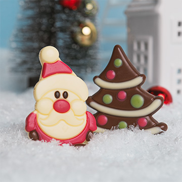 Św, Mikołaj z białej czekolady z choinką