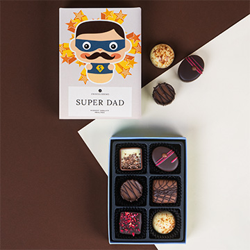 komiksowa oprawa pralin dla super ojca