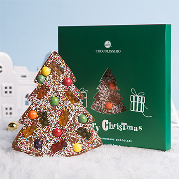 Świąteczna tafla mlecznej czekolady w kształcie choinki w ozdobnym pudełeczku