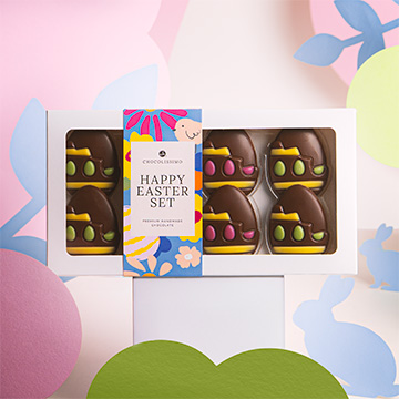 czekoladowe figurki w kształcie pisanek w ozdobnym opakowaniu