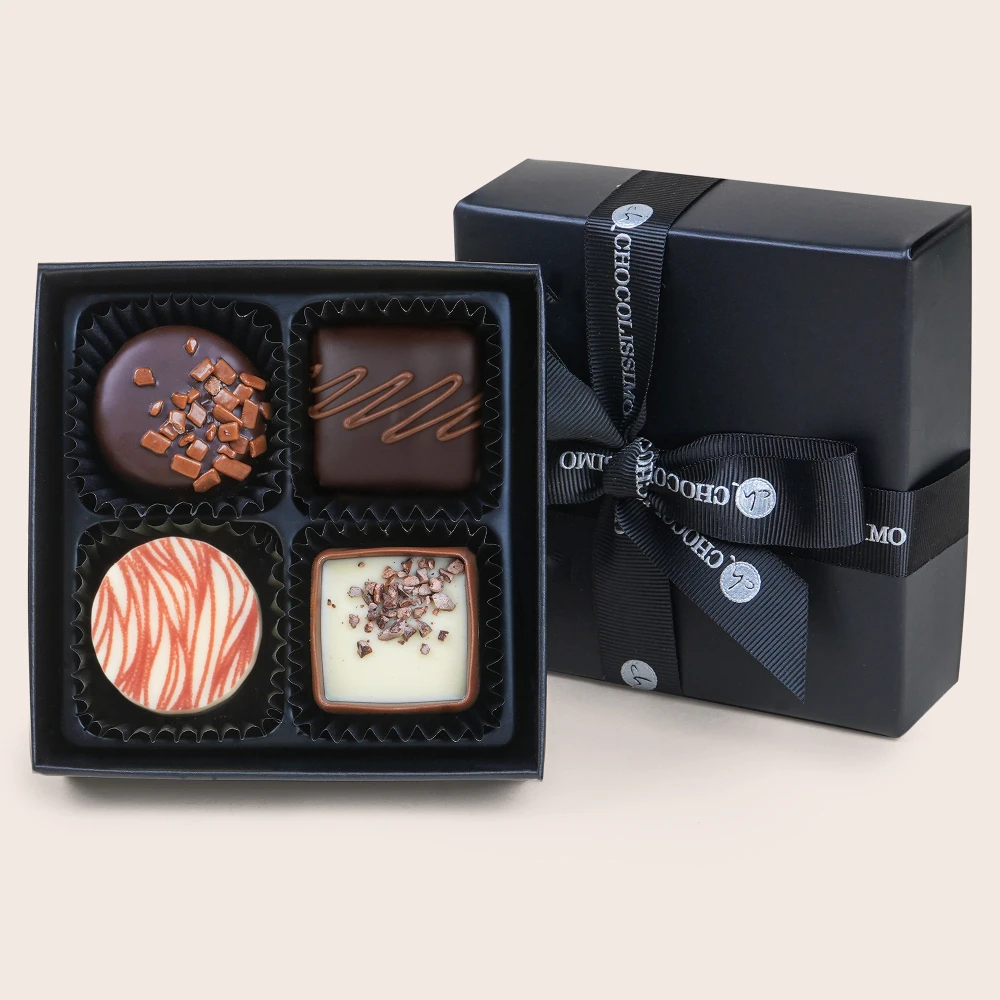 その他 chocolat Cztery pyszne czekoladowe pralinki w czarnym pudełeczku